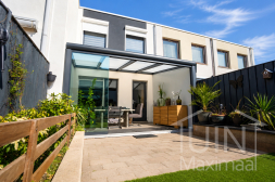 Gartenraum-Überdachung mit Glasschiebewand Gartenraum-Überdachung mit Glasschiebewand